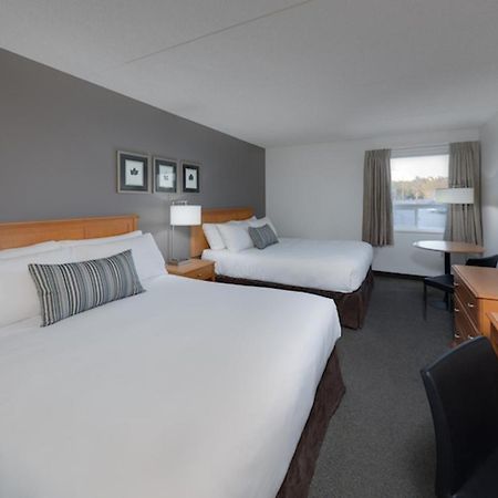 Heritage Inn Hotel & Convention Centre - Муус Джоу Екстериор снимка