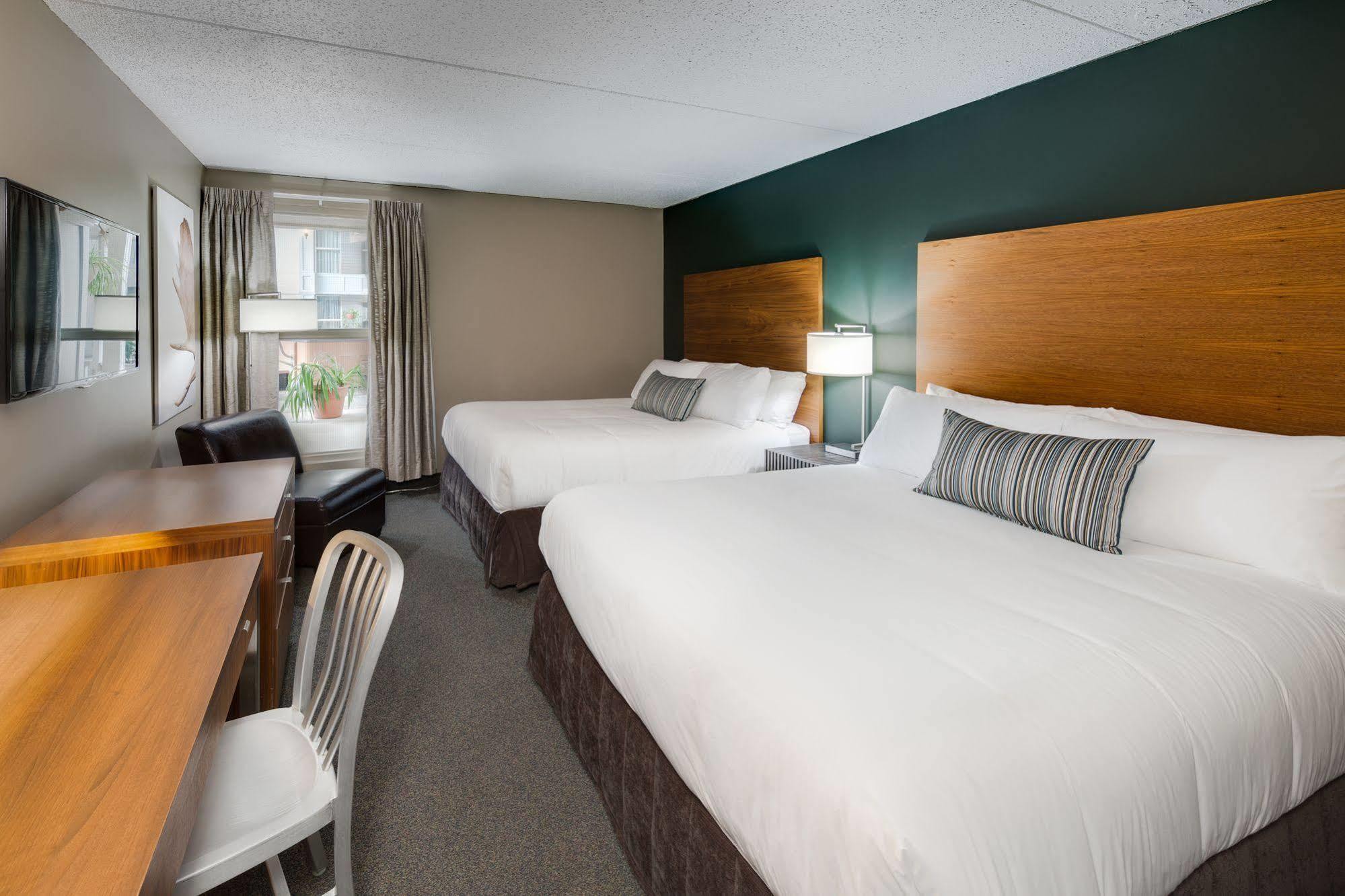 Heritage Inn Hotel & Convention Centre - Муус Джоу Екстериор снимка